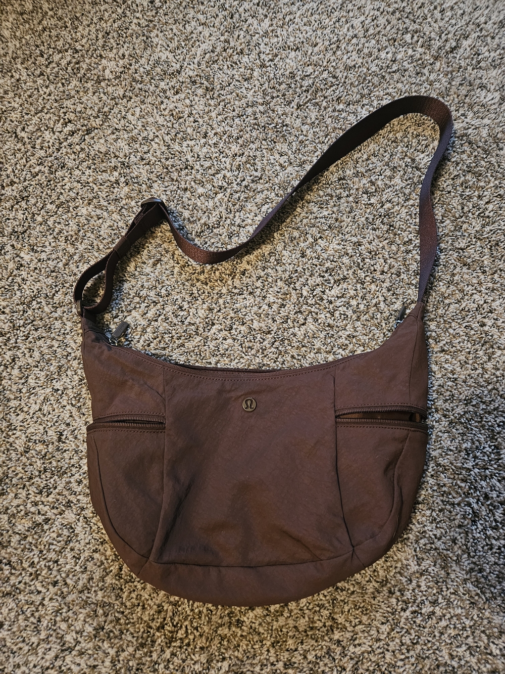 Like New lululemon athletica Brown Slouchy Sling Bag 6L.